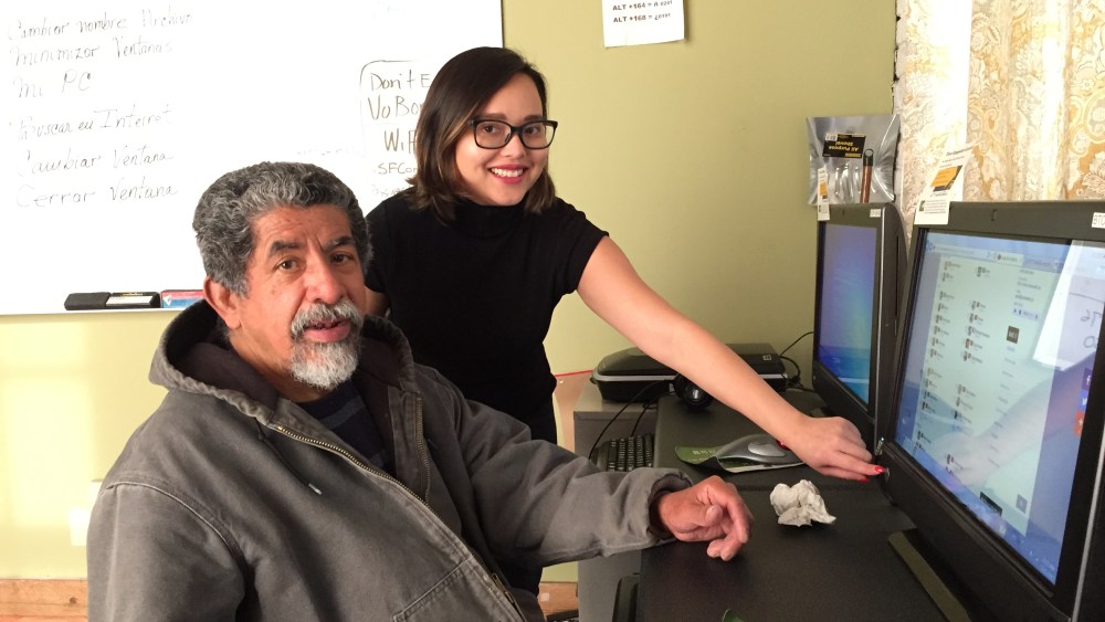 Photo of volunteer Anna and learner Fernando